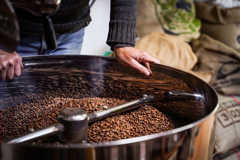 Chris from Surrey Hills Coffee checking the roast level